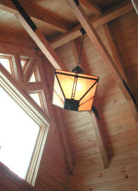 Craftsman-style chandelier at Snowshoe lodge