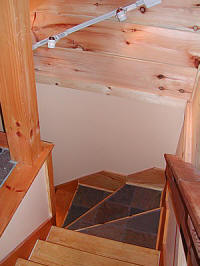 Custom halogen lighting, slate and wood stairs
